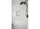 Shower featuring subway tile surround and modern fixtures at 140 Meridian Hills Blvd, Indianapolis, IN 46260