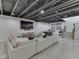 Finished basement with ping pong table, stairs, and large entertainment center at 14464 Gainesway Cir, Fishers, IN 46040