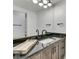 Bathroom features a granite countertop, modern fixtures, ample cabinet space, and a bright, well-lit vanity area at 14464 Gainesway Cir, Fishers, IN 46040