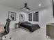 Bedroom with neutral color palette, dark furniture, and lots of natural light at 14464 Gainesway Cir, Fishers, IN 46040