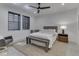 Bright bedroom with natural light features a modern design, neutral colors, and comfortable furnishings for a serene retreat at 14464 Gainesway Cir, Fishers, IN 46040
