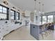 Modern, spacious kitchen featuring a large center island, modern appliances, and stylish pendant lighting at 14464 Gainesway Cir, Fishers, IN 46040