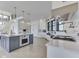 Well-appointed kitchen with a large island, sleek cabinetry, and high-end stainless steel appliances at 14464 Gainesway Cir, Fishers, IN 46040