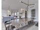 Contemporary kitchen featuring an oversized island, modern appliances, and sleek finishes at 14464 Gainesway Cir, Fishers, IN 46040