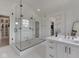 The primary bathroom features a walk-in shower with a glass enclosure and dual shower heads at 14464 Gainesway Cir, Fishers, IN 46040
