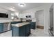 Modern kitchen featuring granite countertops, stainless steel appliances, and ample cabinet space at 14542 Baldwin Ln, Carmel, IN 46032
