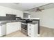 Kitchen features stainless appliances and granite countertops at 156 N Eastern Village Dr, Greenfield, IN 46140
