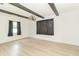 Living room boasts exposed beams and plenty of natural light at 156 N Eastern Village Dr, Greenfield, IN 46140