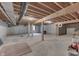 Spacious unfinished basement with concrete floor, exposed ceiling, and natural light at 1751 S Centennial Ave, New Palestine, IN 46163