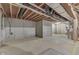 Unfinished basement with exposed utilities, concrete walls, and ample space for customization at 1751 S Centennial Ave, New Palestine, IN 46163