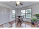 Charming breakfast nook features ample sunlight, cozy seating, and views of surrounding countryside at 1751 S Centennial Ave, New Palestine, IN 46163