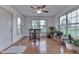 Bright breakfast nook with hardwood floors, large windows, and views of the surrounding landscape at 1751 S Centennial Ave, New Palestine, IN 46163