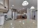 Bright kitchen showcasing granite counters, stainless appliances, and ample cabinet space for the home chef at 1751 S Centennial Ave, New Palestine, IN 46163