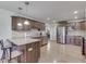 Well-appointed kitchen with stainless steel appliances, ample cabinet space, and a seamless transition to dining area at 1751 S Centennial Ave, New Palestine, IN 46163