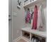 This mud room provides storage and organization with a bench, shoe storage, and coat hooks at 1751 S Centennial Ave, New Palestine, IN 46163