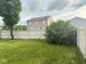 Well-maintained backyard with a large green lawn, providing ample space for outdoor activities and relaxation at 1774 Blue Grass Pkwy, Greenwood, IN 46143
