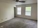 Inviting bedroom filled with natural light, plush carpeting, and neutral walls creating a cozy retreat at 1774 Blue Grass Pkwy, Greenwood, IN 46143