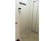 A hallway featuring a coat rack, a switch and tile flooring at 1774 Blue Grass Pkwy, Greenwood, IN 46143