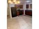 Functional kitchen featuring modern black appliances and warm wood cabinets, creating an inviting culinary space at 1774 Blue Grass Pkwy, Greenwood, IN 46143