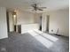 Expansive upstairs living area featuring a staircase, bright natural light, and neutral tones at 1774 Blue Grass Pkwy, Greenwood, IN 46143