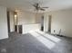 Open upstairs living area featuring neutral walls, bright natural light, and a staircase at 1774 Blue Grass Pkwy, Greenwood, IN 46143