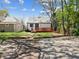 Backyard of home with wood deck and grass at 1837 S East St, Indianapolis, IN 46225
