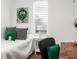 Bright bedroom with a bed, desk, and decor at 1837 S East St, Indianapolis, IN 46225