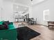 Bright, airy living area with an open floor plan leading to the kitchen at 1837 S East St, Indianapolis, IN 46225
