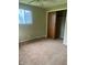 Functional bedroom with carpet, natural light, a closet for storage, and neutral-colored walls at 2026 S Q St, Elwood, IN 46036