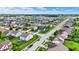 Sprawling residential community with diverse home styles, green spaces, and a peaceful suburban setting at 2201 Schoolmarm Dr, Greenfield, IN 46140