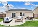 This backyard features a patio perfect for relaxing and entertaining at 2201 Schoolmarm Dr, Greenfield, IN 46140