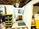 Basement bathroom features toilet, shower, sink, mirror, and vinyl flooring at 2221 E 35Th St, Anderson, IN 46013
