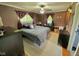 Warm bedroom with a ceiling fan and two windows for natural light at 2221 E 35Th St, Anderson, IN 46013