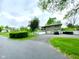 Large driveway leading to a two-car garage at 2221 E 35Th St, Anderson, IN 46013