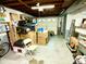 Spacious garage with overhead door, offering ample storage and parking space at 2221 E 35Th St, Anderson, IN 46013