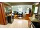 This cozy kitchen offers a dining area with a view, creating a welcoming atmosphere at 2221 E 35Th St, Anderson, IN 46013