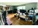Bright living room with hardwood flooring and a large window at 2221 E 35Th St, Anderson, IN 46013