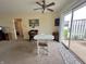 View of the open dining area that leads to a private outdoor patio, perfect for relaxing at 2508 Pamela Ct, Anderson, IN 46012