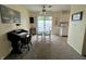 Cozy dining area featuring neutral carpeting, comfortable seating, and a view of the patio at 2508 Pamela Ct, Anderson, IN 46012