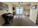 Inviting dining area with a ceiling fan and sliding glass doors to an outdoor patio at 2508 Pamela Ct, Anderson, IN 46012