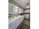 Bright kitchen featuring ample counter space, washer and dryer, and a window for natural light at 2508 Pamela Ct, Anderson, IN 46012