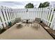 Outdoor patio with two chairs and table at 2508 Pamela Ct, Anderson, IN 46012
