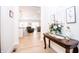 Elegant entryway with hardwood floors and decorative console table at 2686 Lafayette Ave, Columbus, IN 47201