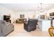Bright open-concept living space with hardwood floors and modern appliances at 2686 Lafayette Ave, Columbus, IN 47201