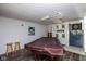 Recreational room featuring a pool table, dartboard, and unique decor, perfect for entertainment at 2929 E 62Nd St, Indianapolis, IN 46220
