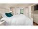 Inviting bedroom with white linens and plush pillows, offering a relaxing and comfortable atmosphere at 2929 E 62Nd St, Indianapolis, IN 46220