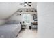 Cozy bedroom with a striped bed, desk, and decoratively placed shelves at 2929 E 62Nd St, Indianapolis, IN 46220