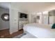 Stylish bedroom with custom built-ins featuring a TV, creating a cozy and functional space at 2929 E 62Nd St, Indianapolis, IN 46220