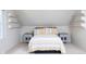 Bedroom with white wood paneling, decorative shelves, and striped bed at 2929 E 62Nd St, Indianapolis, IN 46220