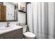Bathroom featuring a modern vanity with sink, a framed mirror, and a shower with curtain at 2965 E 1100 N, Pendleton, IN 46064